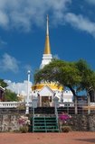 Phra Chedi Luang sits atop Khao Tang Kuan, a hill to the north of Songkhla town. The temple was built during the reign of King Chulalongkorn (Rama V, r.1868 - 1910).<br/><br/>

The name Songkhla is actually the Thai corruption of Singgora (Jawi: سيڠڬورا); its original name means 'the city of lions' in Malay. This refers to a lion-shaped mountain near the city of Songkhla.<br/><br/>

Songkhla was the seat of an old Malay Kingdom with heavy Srivijayan influence. In ancient times (200 AD - 1400 AD), Songkhla formed the northern extremity of the Malay Kingdom of Langkasuka. The city-state then became a tributary of Nakhon Si Thammarat, suffering damage during several attempts to gain independence.